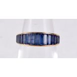 AN 18CT GOLD AND SAPPHIRE RING. 3 grams. J.