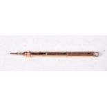 A 9CT GOLD EXTENDING PENCIL. 8.3 grams. 8.5 cm long extended.