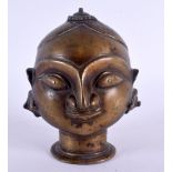 AN UNUSUAL 18TH/19TH CENTURY INDIAN BRONZE BUDDHISTIC BUST modelled wearing coiled earrings. 15 cm x