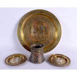 A GROUP OF ANTIQUE MIDDLE EASTERN CAIRO WARE SILVER INLAID WARES. Largest 25 cm diameter. (4)