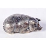 A CONTINENTAL SILVER PIG WITH GEM SET EYES. Stamped 88, 2.4cm x 6cm x 3.1cm, weight 30.8g