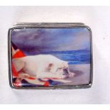 A CONTINENTAL SILVER PILL BOX DECORATED WITH A BRITISH BULLDOG. Stamped Sterling, 1.3cm x 2.6cm x 3