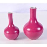 A pair of Chinese porcelain pink glazed vases largest 14 cm (2).