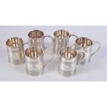 A RARE SET OF SIX MINIATURE VICTORIAN SILVER MUGS. London 1887. 260 grams. 5.5 cm x 4.5 cm. (6)