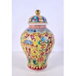 A Chinese porcelain polychrome jar and cover decorated in relief with blossom ,24cm.