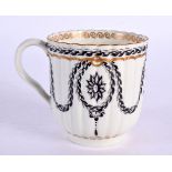 18th century Worcester coffee cup painted of fluted shape painted in black with a neo-classical styl