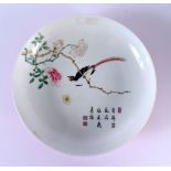 A CHINESE REPUBLICAN PERIOD FAMILLE ROSE RUBY GROUND PORCELAIN DISH bearing Yongzheng marks to base.