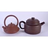TWO CHINESE YIXING POTTERY TEAPOTS AND COVER 20th Century. Largest 14 cm wide. (2)