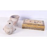 A clay pipe probably South American together with an Islamic inlaid wooden box decorated with horse