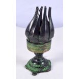 A small Tibetan Incense burner in the form of a flower petal 9cm