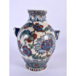 A FINE 19TH CENTURY MIDDLE EASTERN OTTOMAN FAIENCE PORCELAIN VASE painted with flowers. 13 cm high.