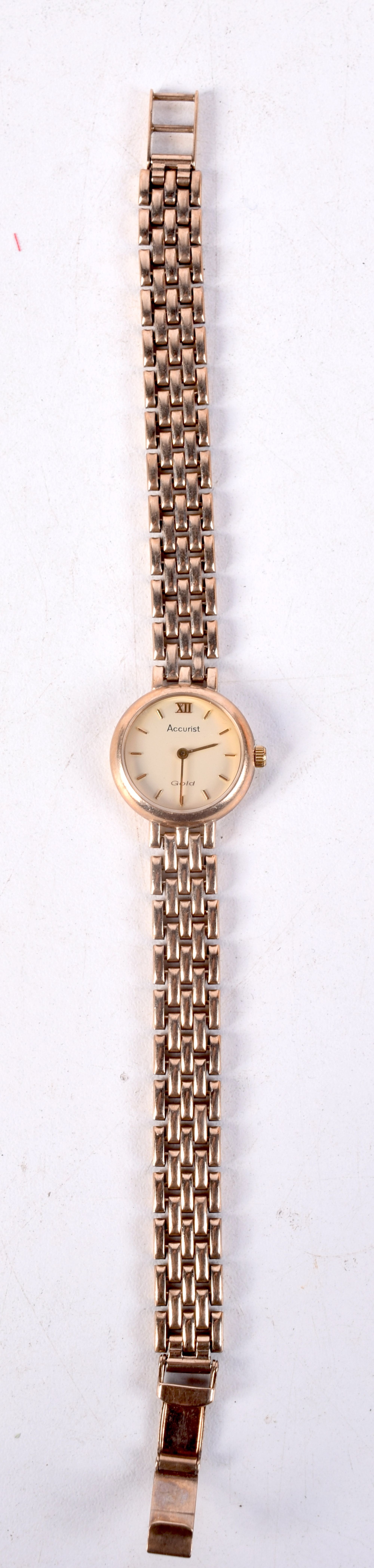 A 9CT GOLD ACCURIST WRISTWATCH with 9ct gold strap. 22 grams. 2 cm wide inc crown.