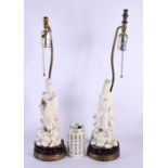 A LARGE PAIR OF 19TH CENTURY CHINESE BLANC DE CHINE PORCELAIN LAMPS. 50 cm high.