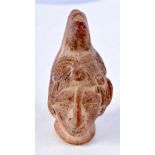 A SOUTH AMERICAN POTTERY BUST. 9.5 cm x 8.5 cm.