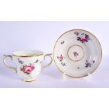 18th century Chelsea Derby two handled chocolate cup and stand painted with flowers in the style of