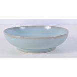 A Chinese porcelain Ru ware dish 14 cm diameter .