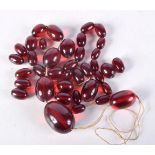 ASSORTED CHERRY AMBER TYPE BEADS. 51.5 grams. Largest bead 2.25 cm x 1.5 cm. (qty)