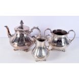 A VICTORIAN THREE PIECE SILVER AND IVORY TEASET. London 1865. 1221 grams. Largest 24 cm x 20 cm. (3)