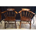 A VINTAGE SMOKERS CHAIR together with another similar. Largest 80 cm high. (2)