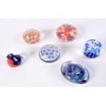 A collection of Millefiori paperweights together with three other paperweights largest 6 x 8.5 cm (6