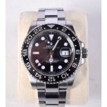 A ROLEX GMT MASTER II BOXED 116710LN WRISTWATCH. 4.5 cm wide inc crown.