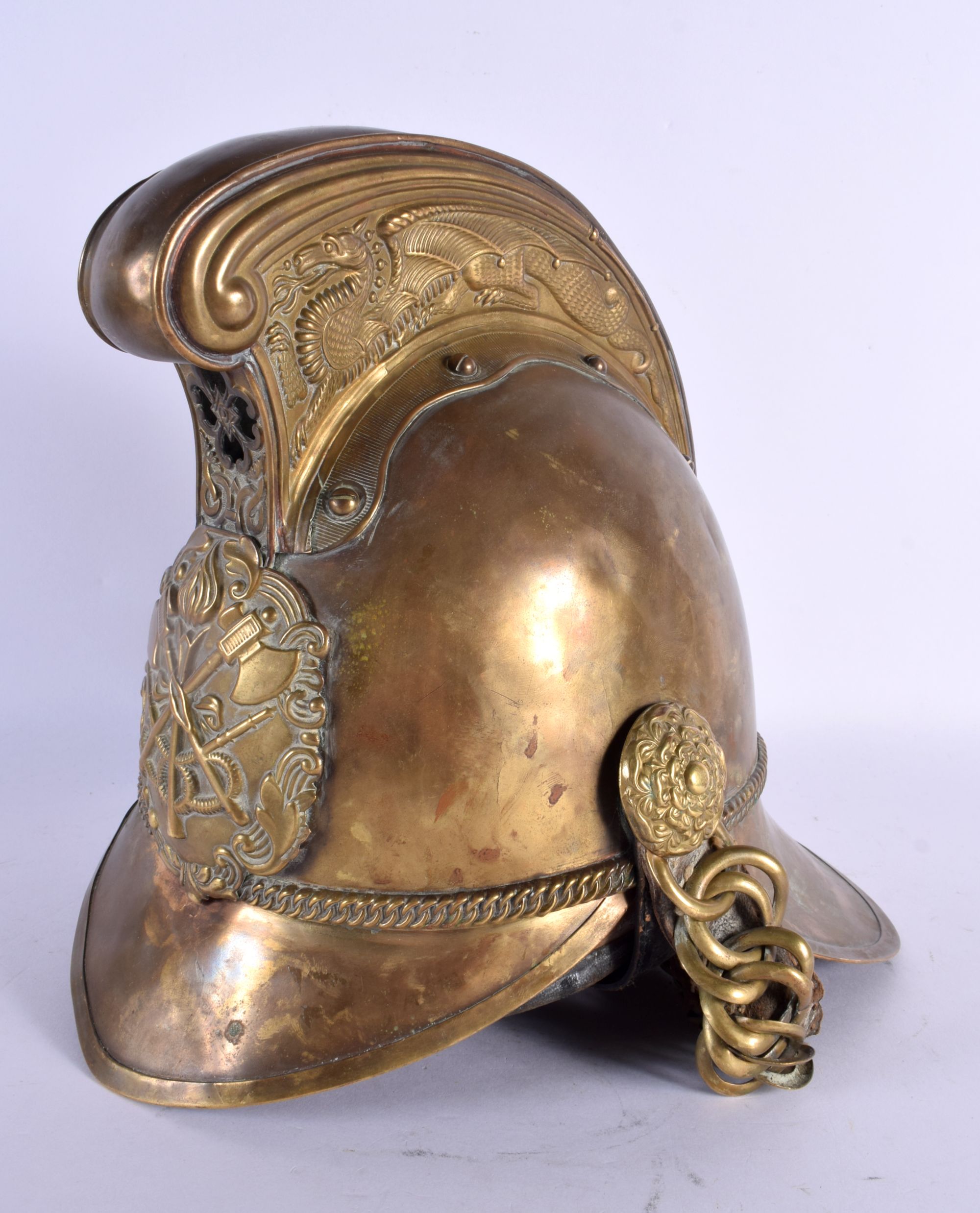 AN ANTIQUE FIREMANS HELMET. 24 cm x 20 cm.