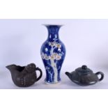 AN EARLY 20TH CENTURY CHINESE YIXING POTTERY CALLIGRAPHY TEPAOT AND COVER together with a creamer &