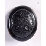 A VICTORIAN CARVED JET MOURNING BROOCH. 5 cm x 4 cm.