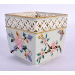 Royal Worcester reticulated pot in Japanese taste moulded and painted with prunus blossoms and butte