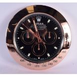 A ROLEX SHOP DISPLAY ADVERTISING WALL CLOCK. 33 cm diameter.