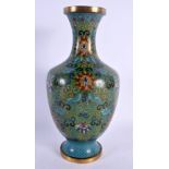 A LATE 19TH CENTURY CHINESE CLOISONNE ENAMEL VASE decorated with foliage. 27 cm high.
