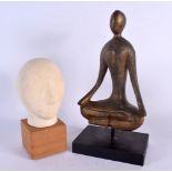 AN UNUSUAL 1950S BISQUE PORCELAIN HEAD together with a lacquered figure of a male meditating. Larges