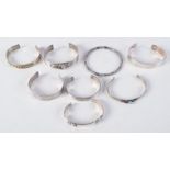 ASSORTED SILVER BANGLES. 193 grams. Largest 6.5 cm wide. (qty)