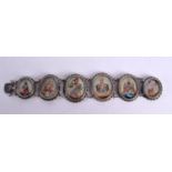 A FINE 19TH CENTURY INDIAN SILVER ENAMEL AND IVORY BRACELET depicting buddhistic figures. 60 grams.