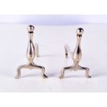 A PAIR OF VINTAGE SILVER ANDIRON KNIFE RESTS. 37 grams. 7.5 cm x 5 cm.