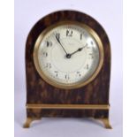 AN ANTIQUE TORTOISESHELL MANTEL CLOCK. 18 cm x 12 cm.