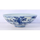 A Chinese porcelain blue and white bowl decorated with children 7 x 19 cm.