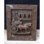 A 19/20th Century South East Asian carved wood panel 56 x 47 cm.