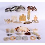 A GOOD COLLECTION OF CHINESE ARCHAIC JADE CARVINGS Warring States and Later, including plaques, bang