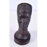 An African Tribal hard carved wooden head 15 cm .