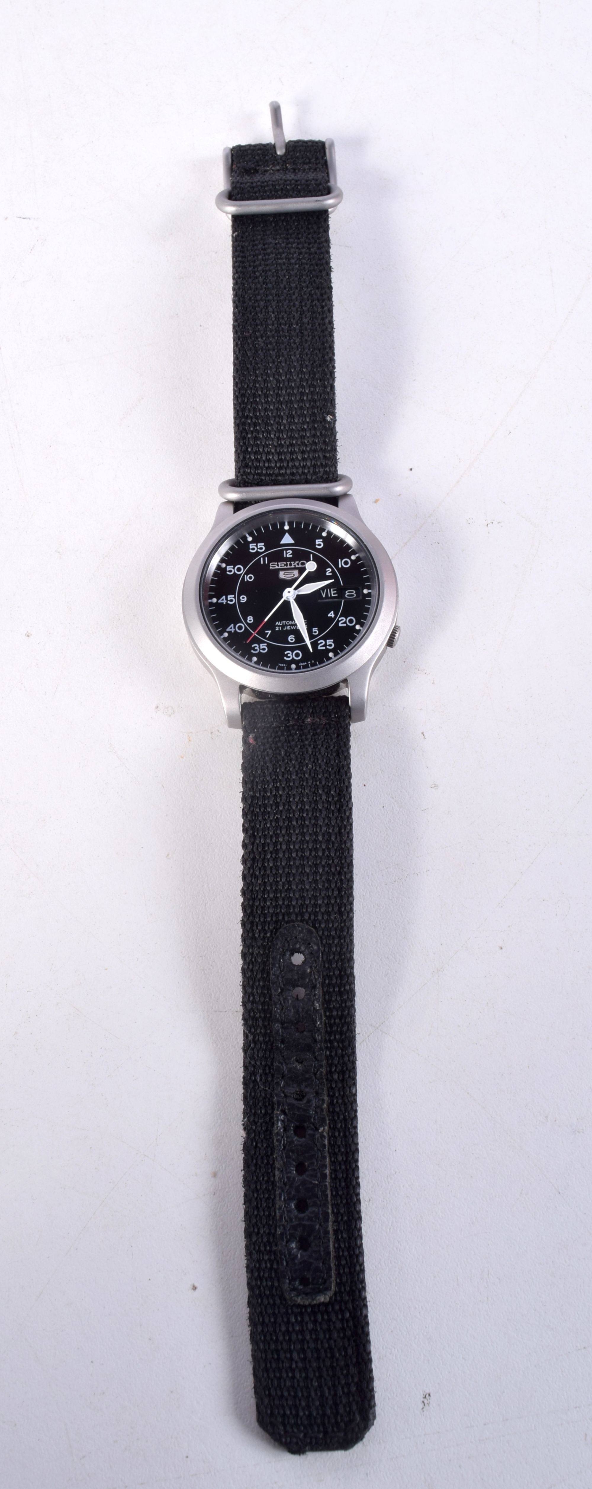 A SEIKO MILITARY WRISTWATCH. 3.75 cm wide inc crown.