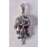 A SILVER SKULL PENDANT. 12 grams. 5.5 cm x 2.5 cm.