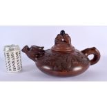 A RARE EARLY 20TH CENTURY CHINESE YIXING POTTERY TEAPOT AND COVER Late Qing/Republic, of unusually l