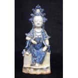 A Chinese porcelain blue and white Guanyin figure 21 cm .