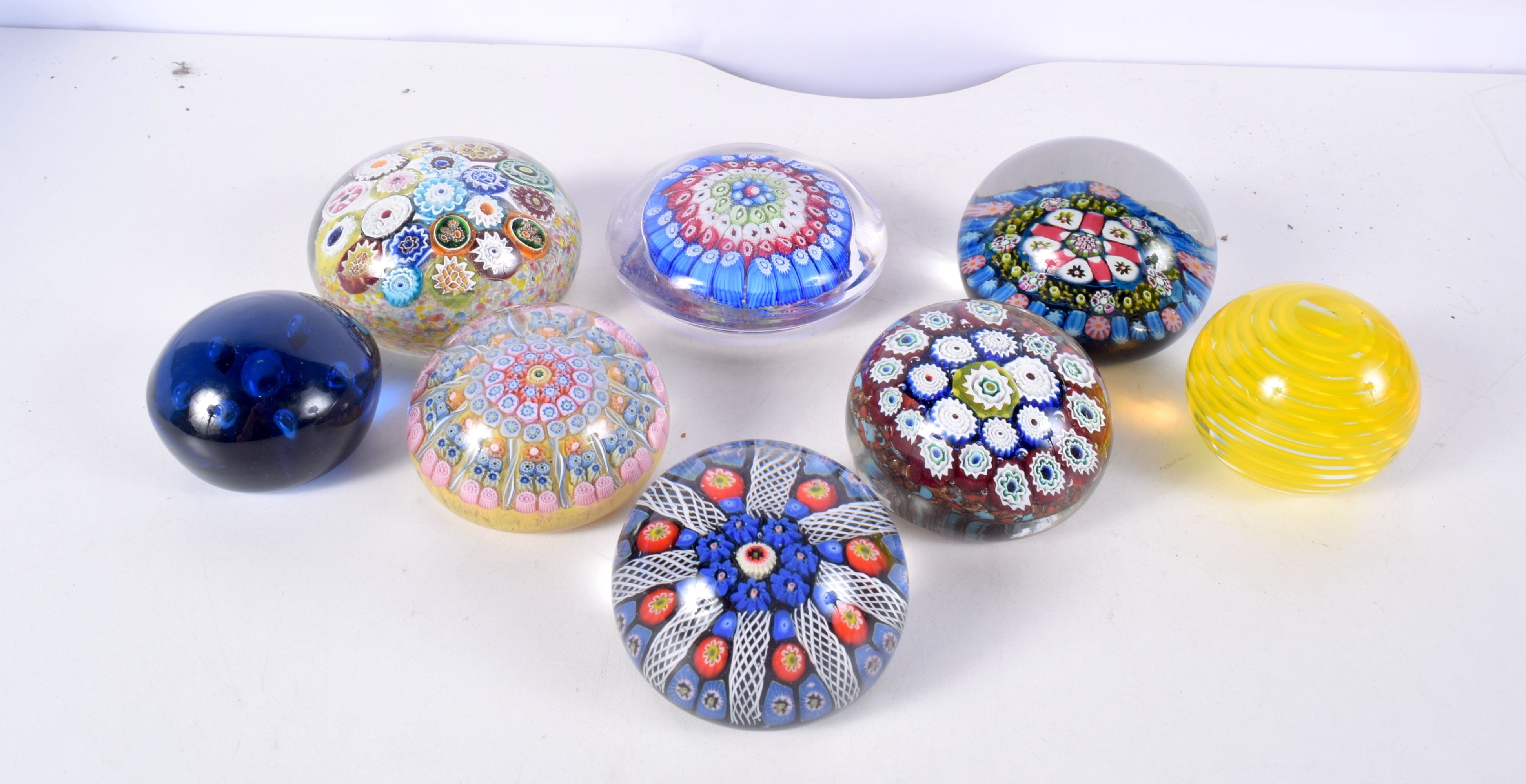 A collection of Paperweights, Millefiori, Perthshire etc largest 10.5 cm (8)