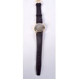 A VINTAGE 9CT GOLD WRISTWATCH. 3 cm wide, strap 24.5 cm long.