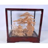 A cased Chinese cork Diorama 27 x 27 x 18 cm.