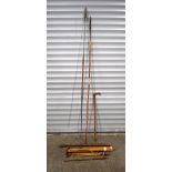 A collection of African tribal items, including spears, a quiver containing arrows, etc. 215cm (9).