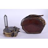 A CASED ANTIQUE BARKERS PATENT NO 1926 4311 INSTRUMENT. 10 cm wide.