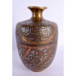 A FINE 19TH CENTURY MIDDLE EASTERN SILVER INLAID BRONZE VASE decorated in mixed metals with scriptur